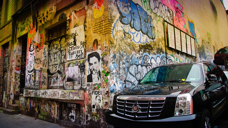 Black SUV in Alley