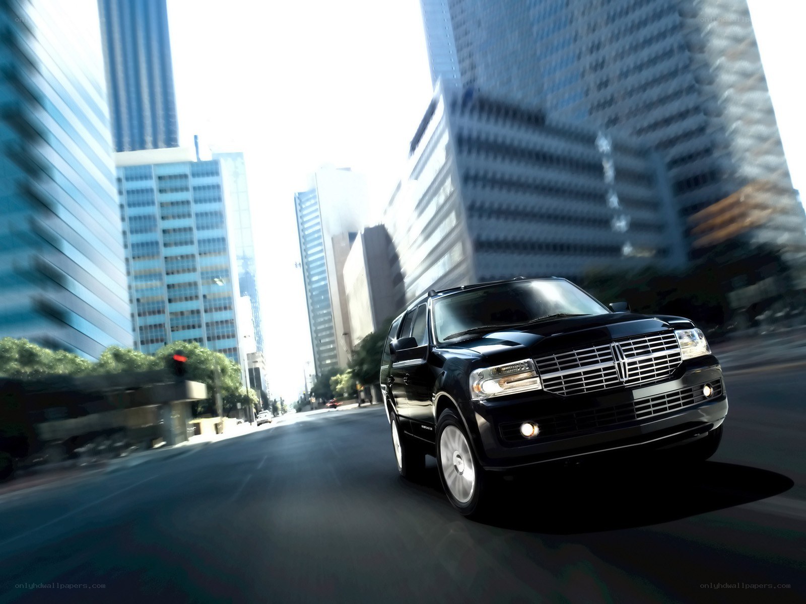 Black SUV in city street