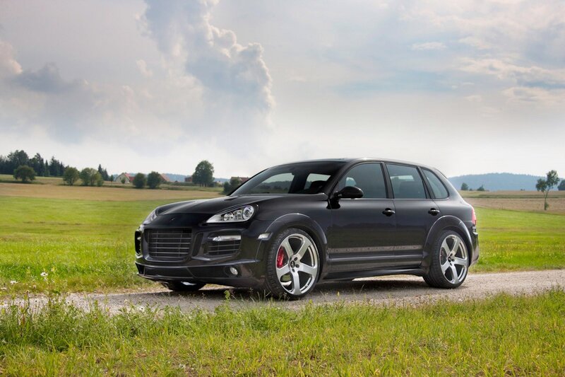 Black SUV in Field