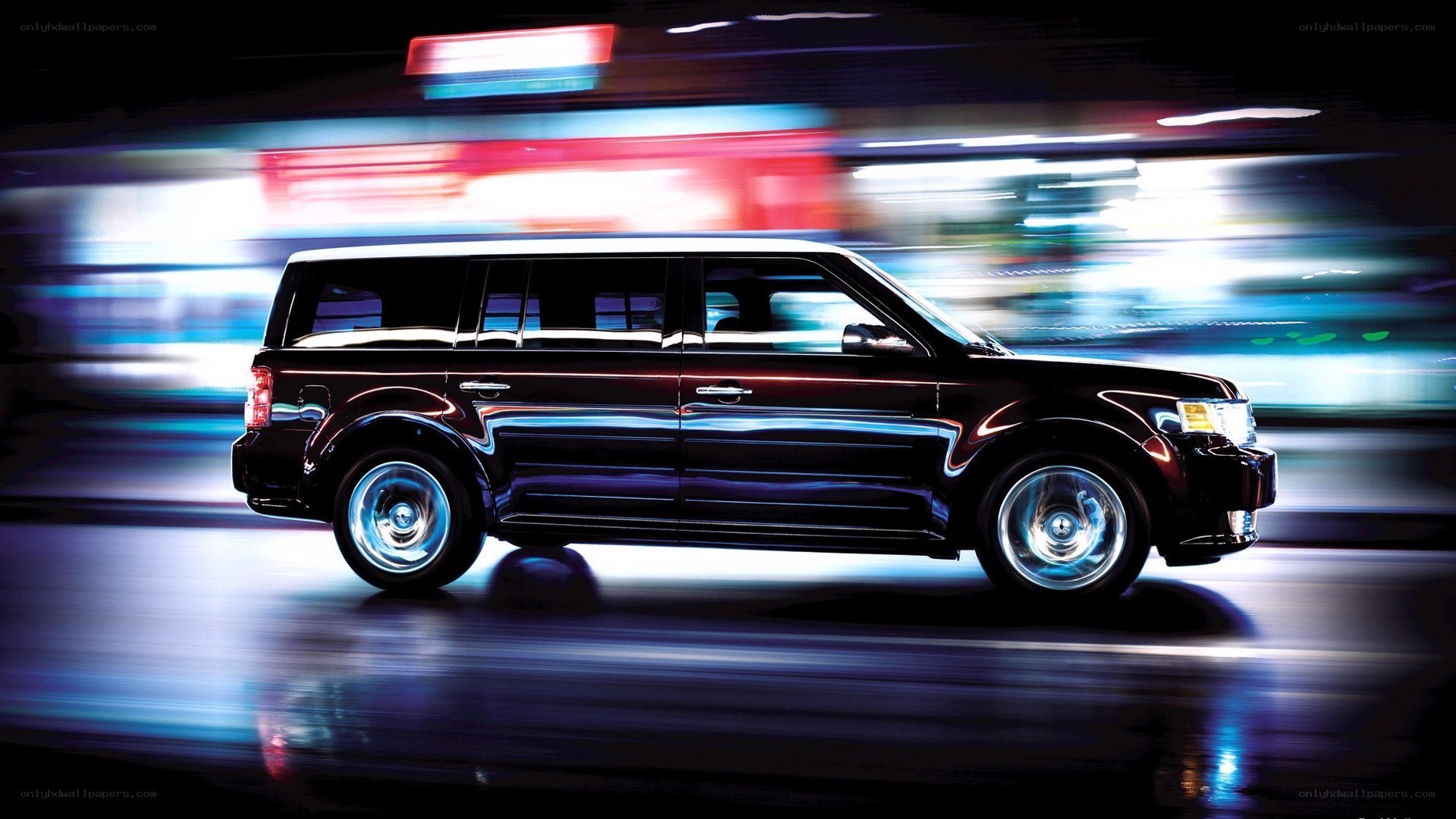 black suv in motion at night