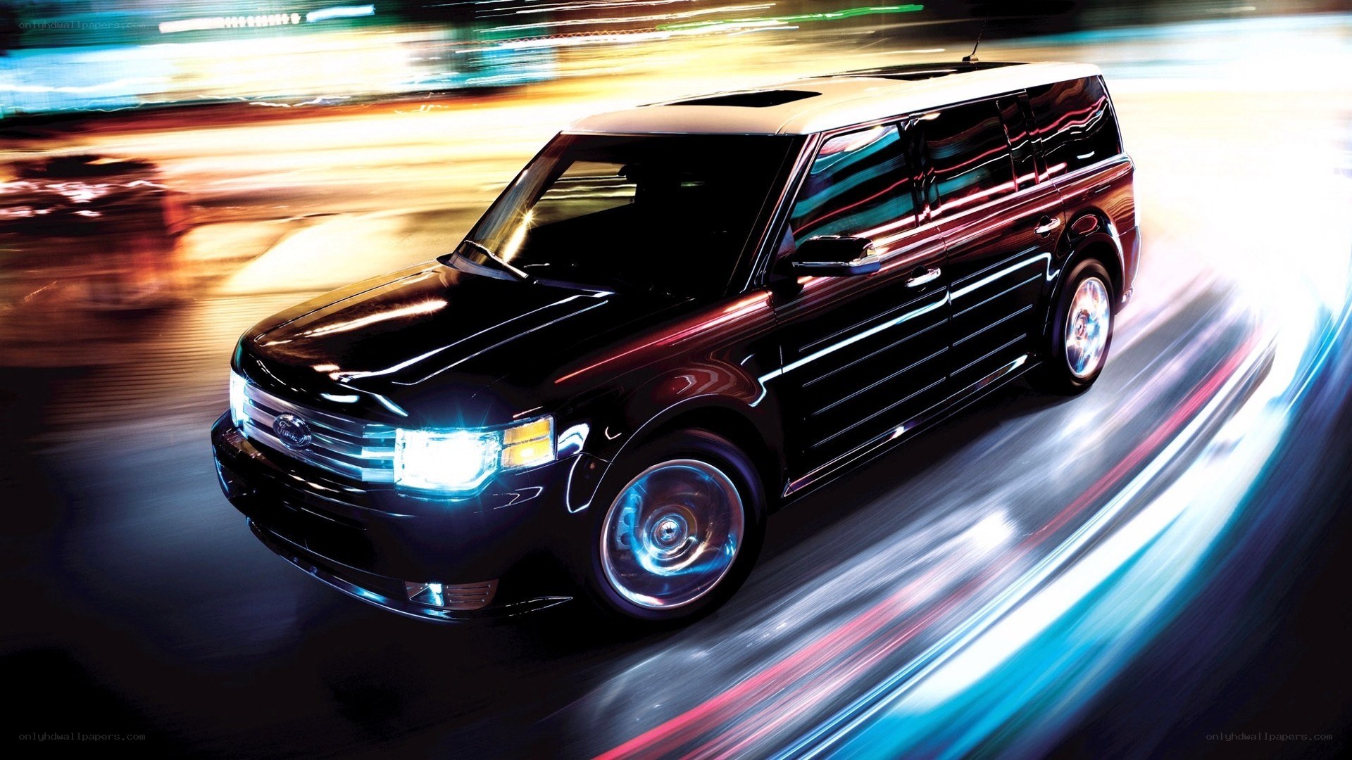 Black SUV in motion at night