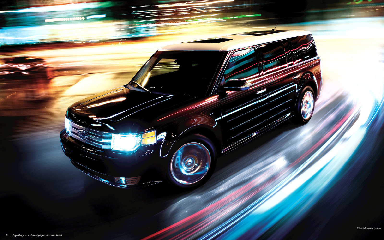 Black SUV in motion at night
