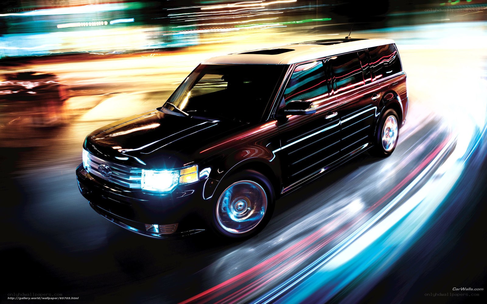 Black SUV in motion at night