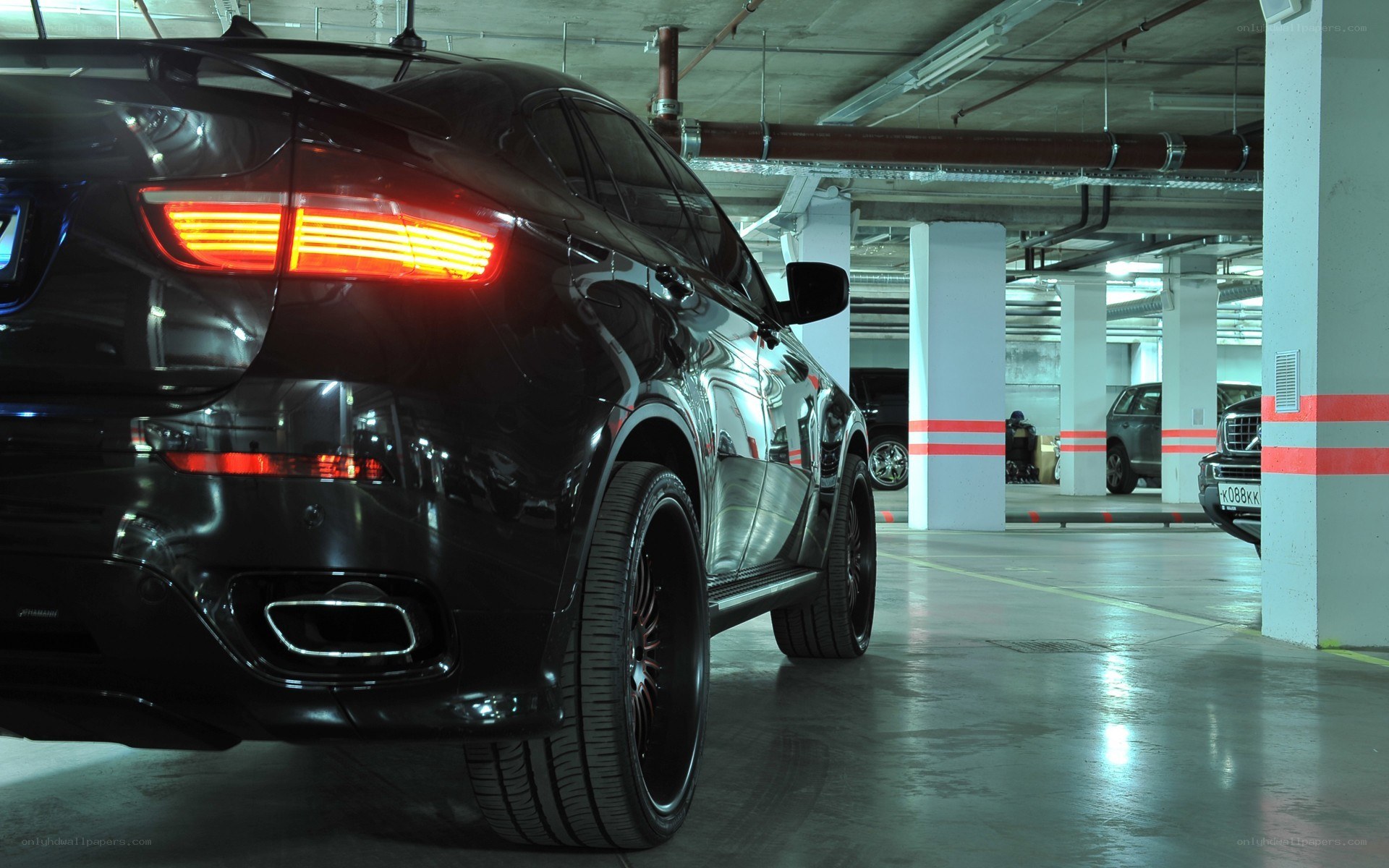 Black SUV in parking garage
