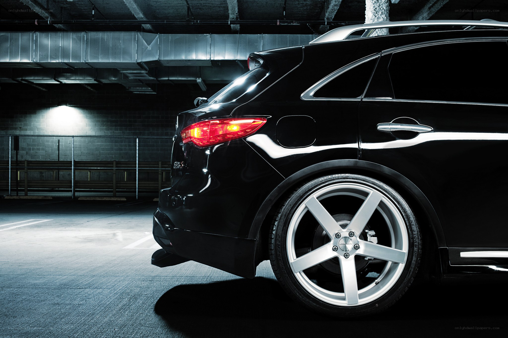 Black SUV in parking garage