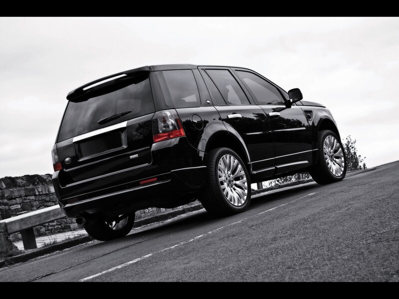 black suv on a road