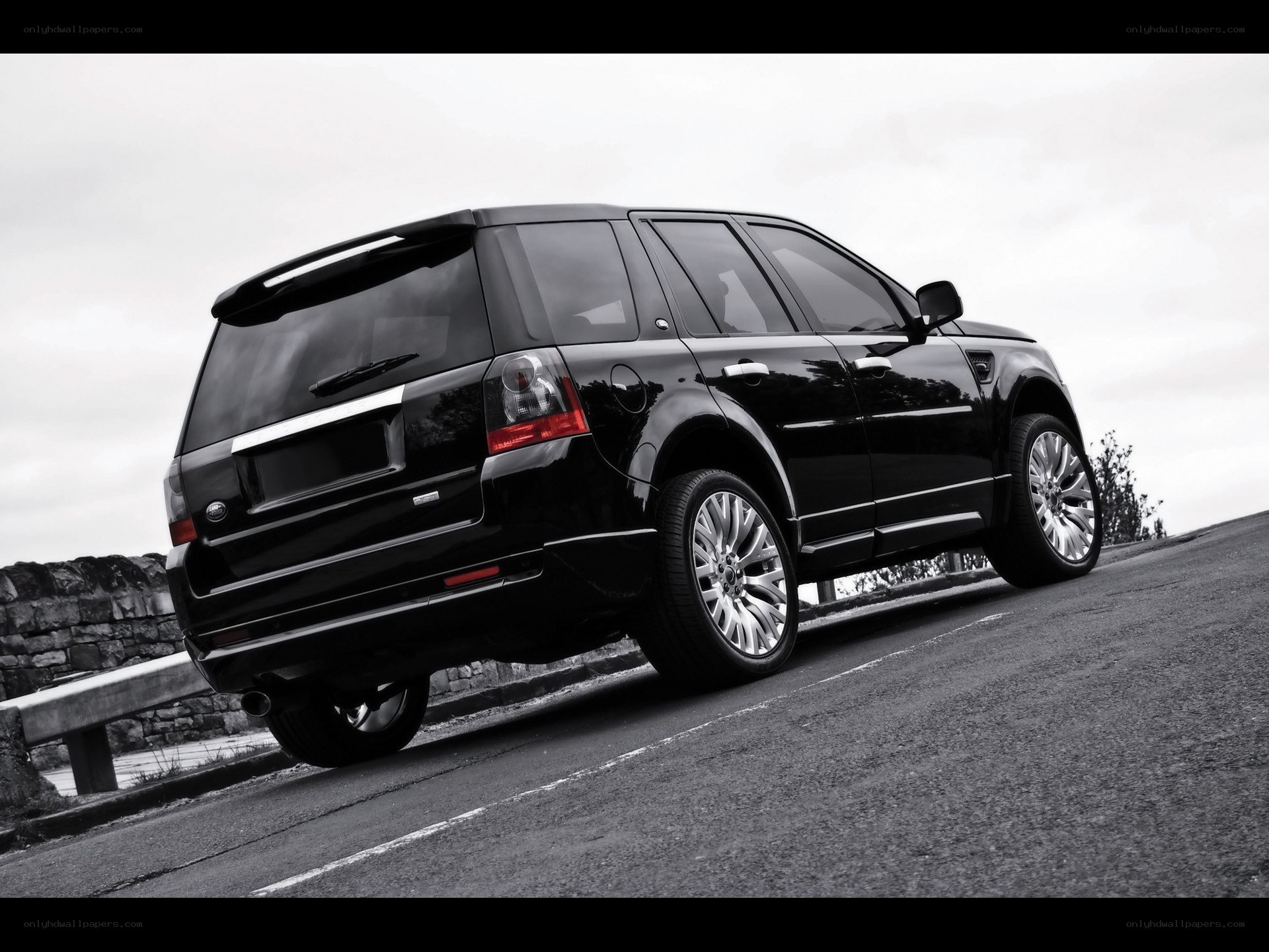 black suv on a road