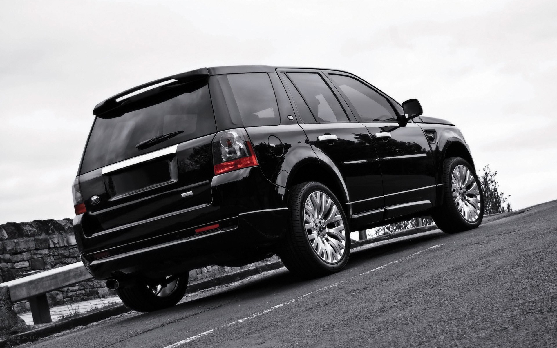 black suv on a road