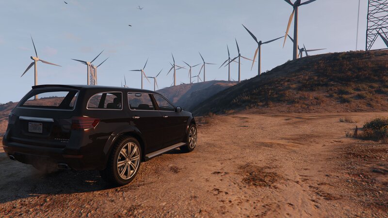 Black SUV on Dirt Road
