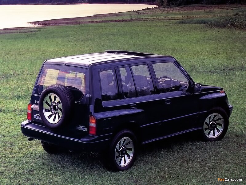 Black Suv on Grass — Serene