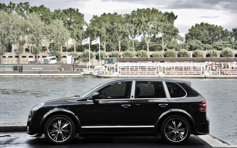Black SUV on Riverbank