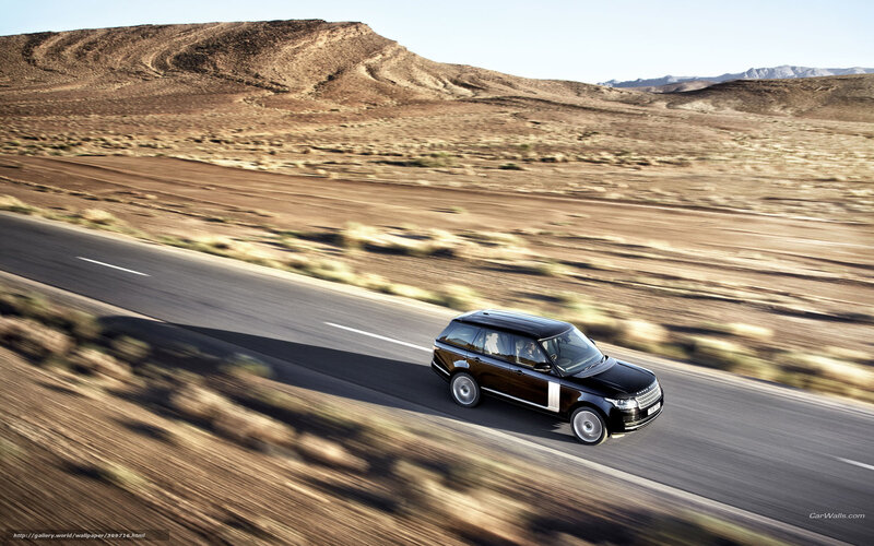 Black SUV on Road — Brown