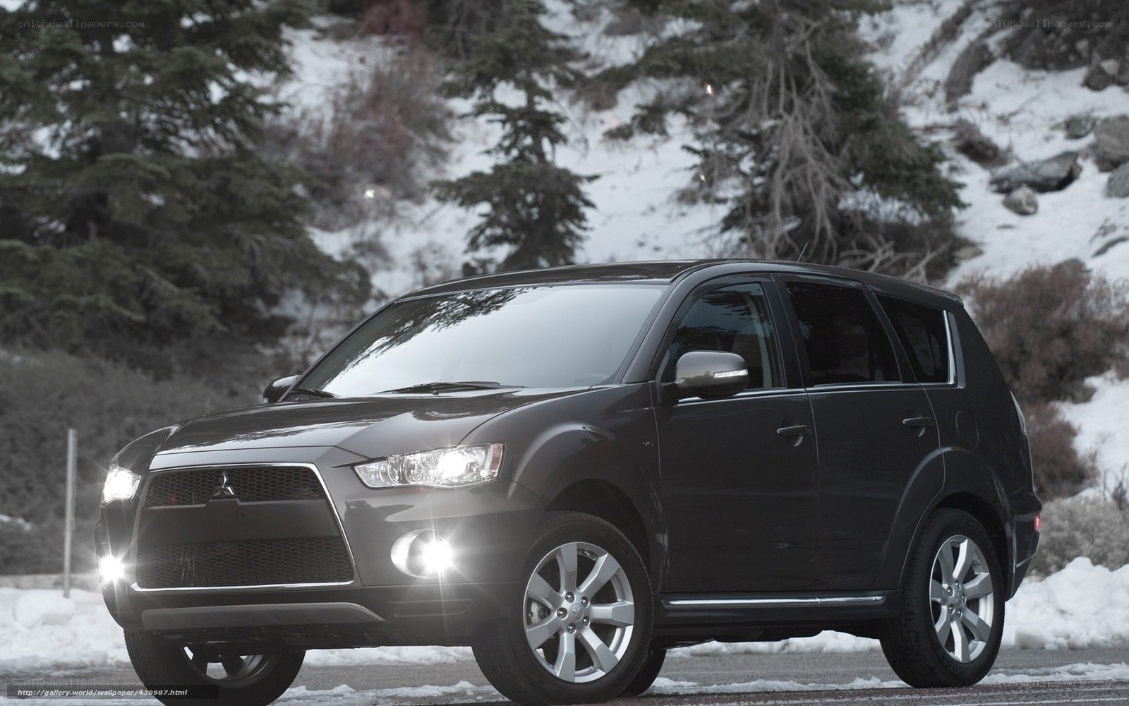 Black SUV on snowy road