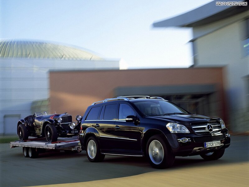 Black Suv Towing Car