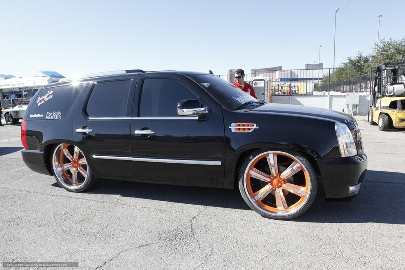 Black SUV with custom wheels
