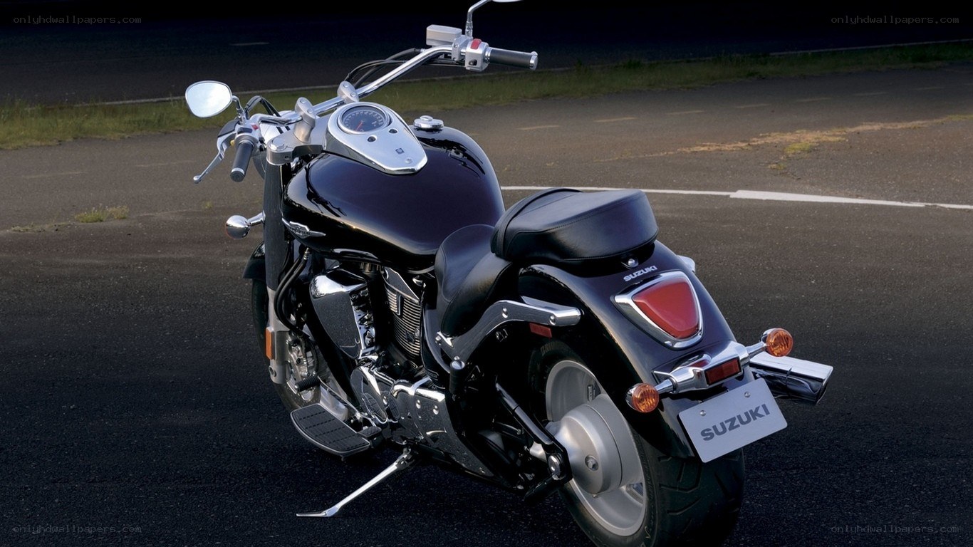 black suzuki motorcycle on road