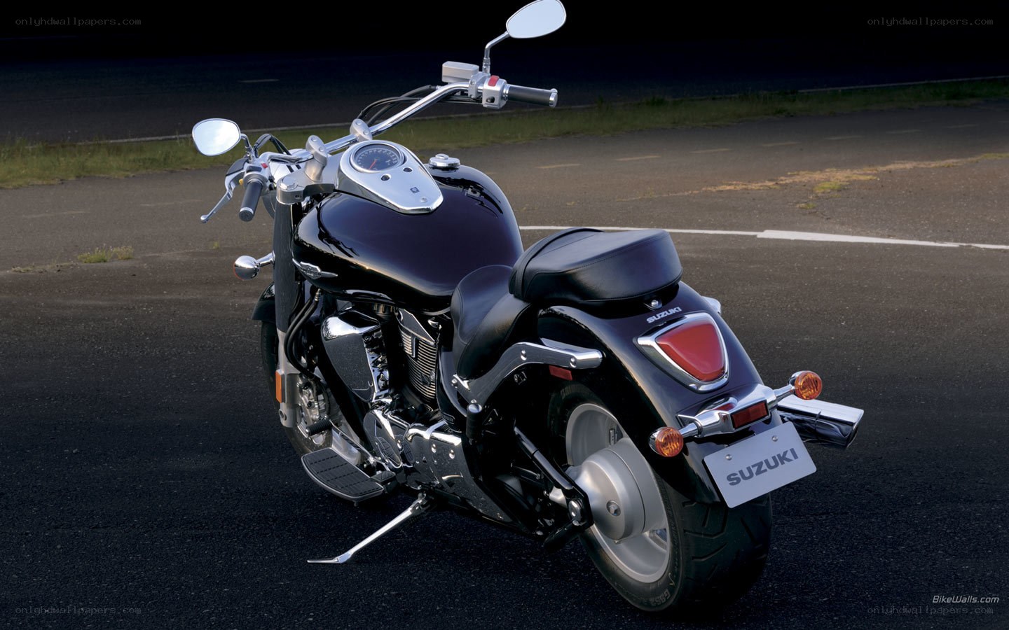 Black Suzuki motorcycle on road