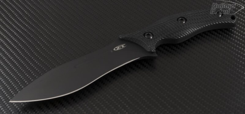 Black Tactical Knife — Neutral, Photograph, Carbon Fiber Surface