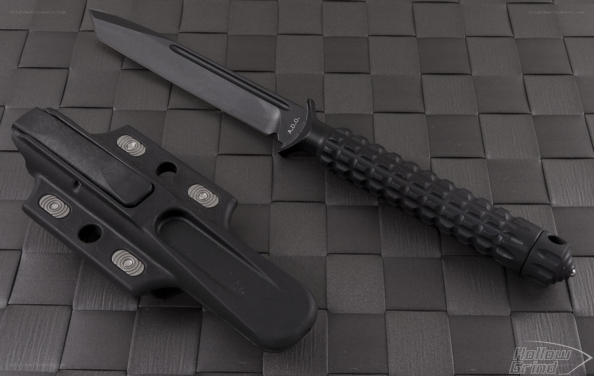 black tactical knife with sheath