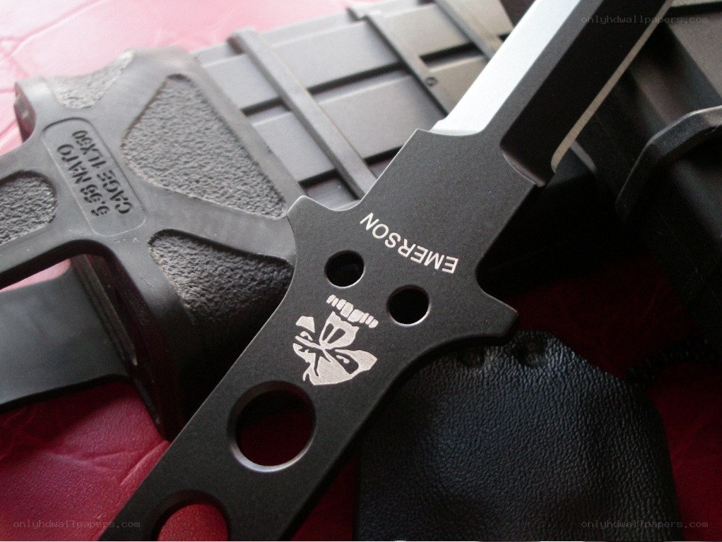 black tactical knife with sheath