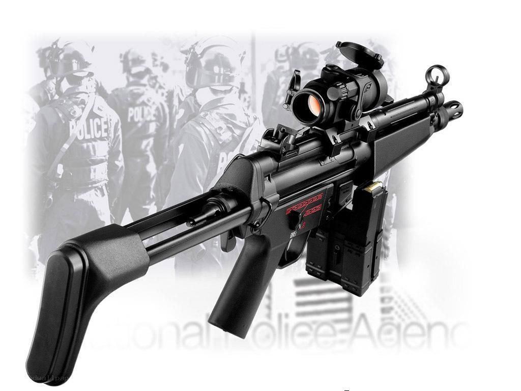 Black tactical rifle with scope