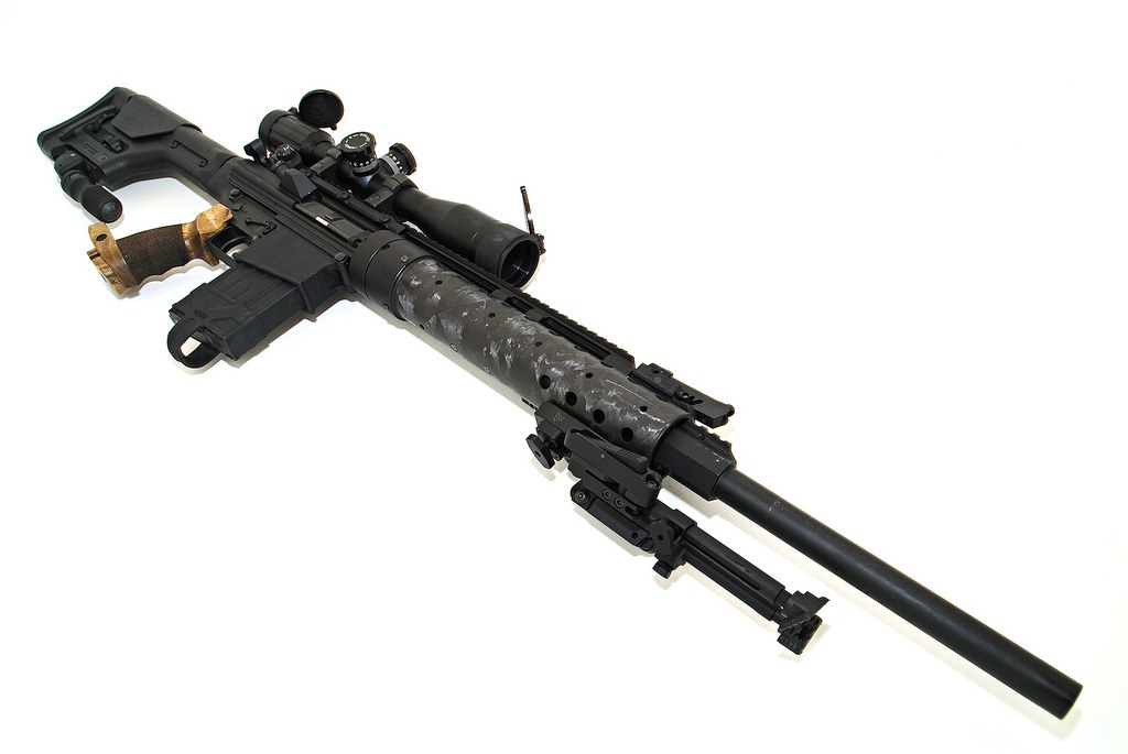 black tactical rifle with scope