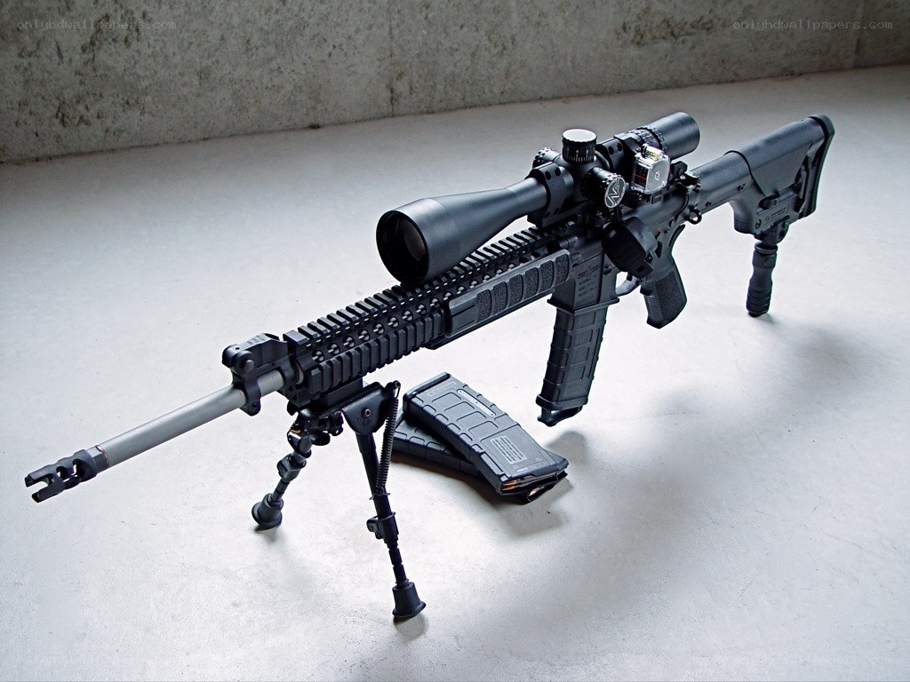 black tactical rifle with scope
