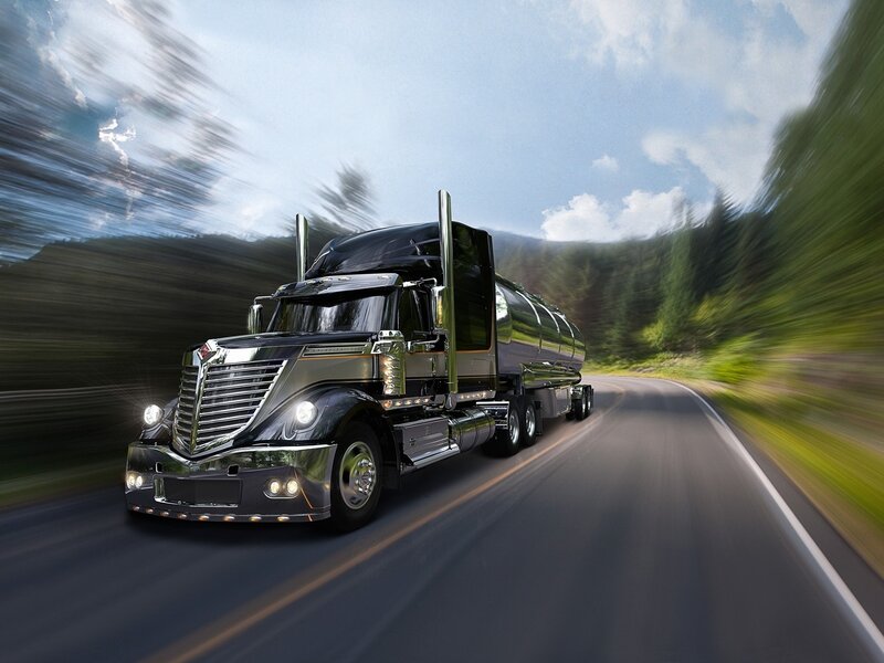 Black Tanker Truck — Dynamic, Afternoon, Photograph, Road, Trees, Sky