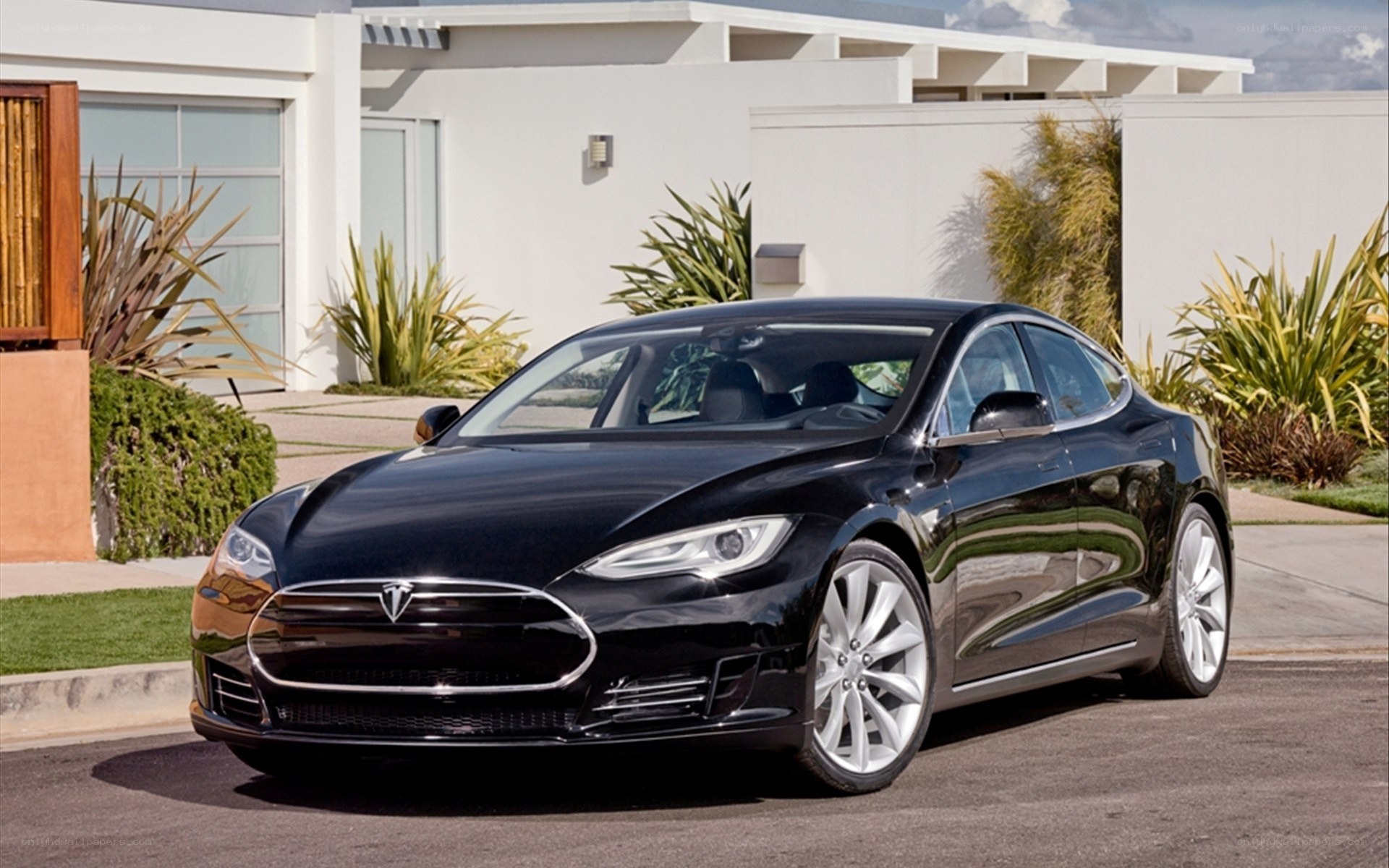 Black Tesla Model S parked outside