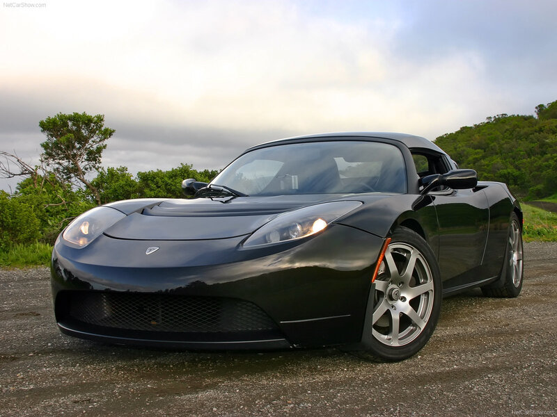 Black Tesla Roadster parked outdoors
