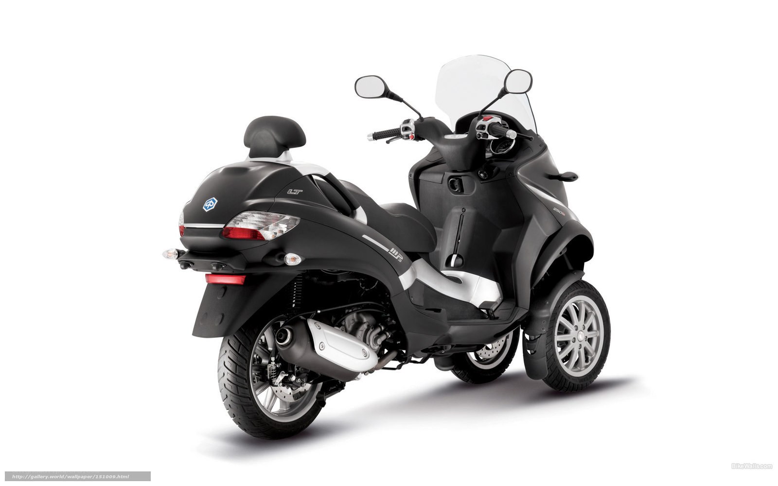 black three-wheeled scooter