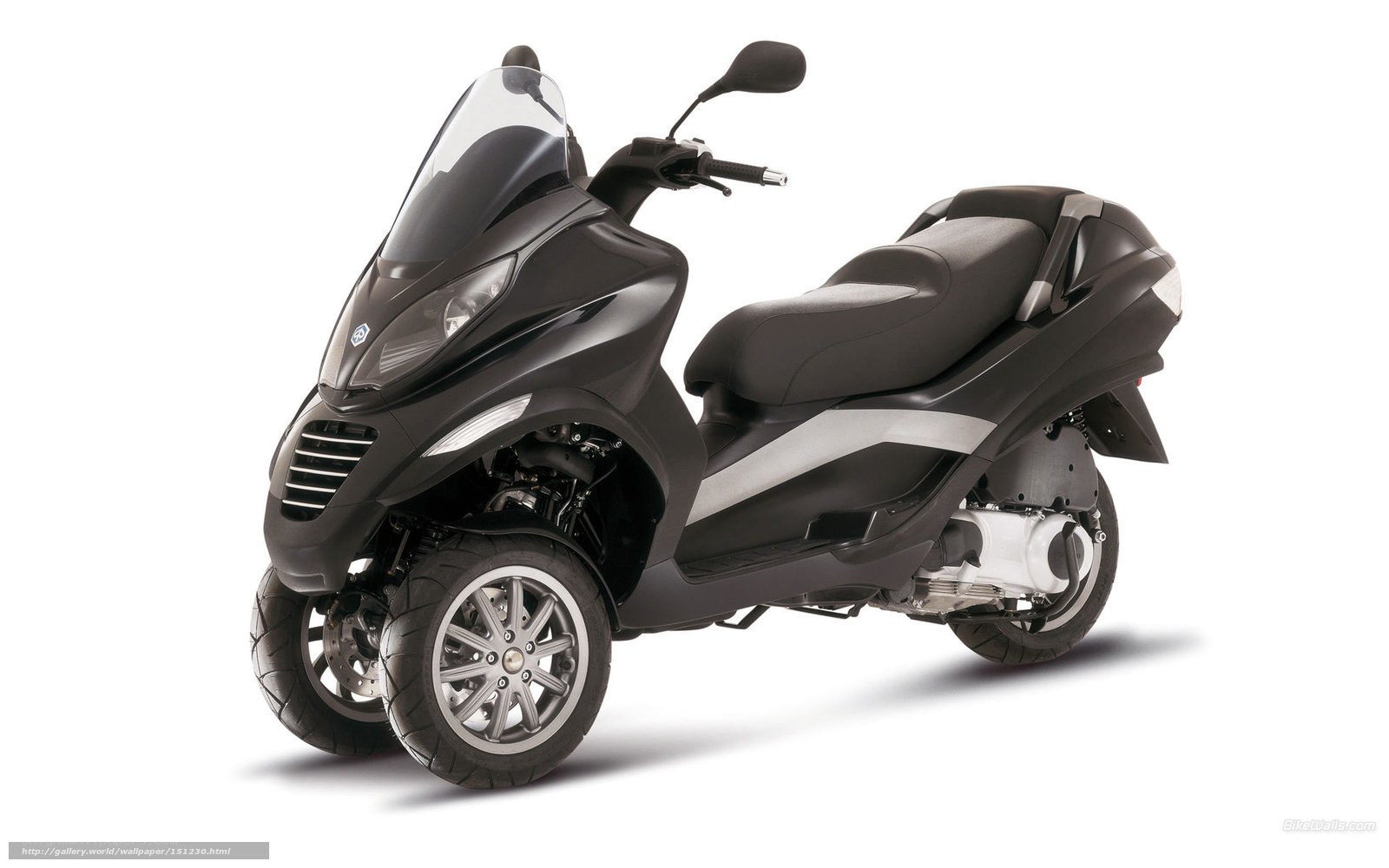 black three-wheeled scooter