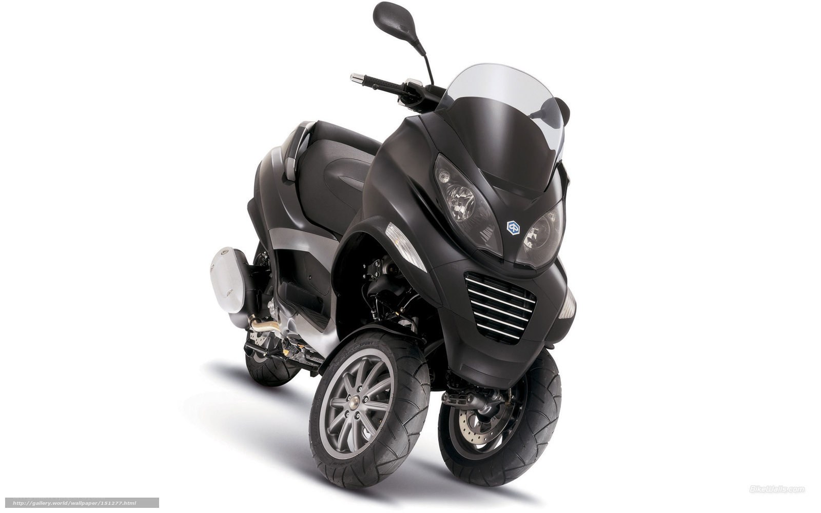 black three-wheeled scooter