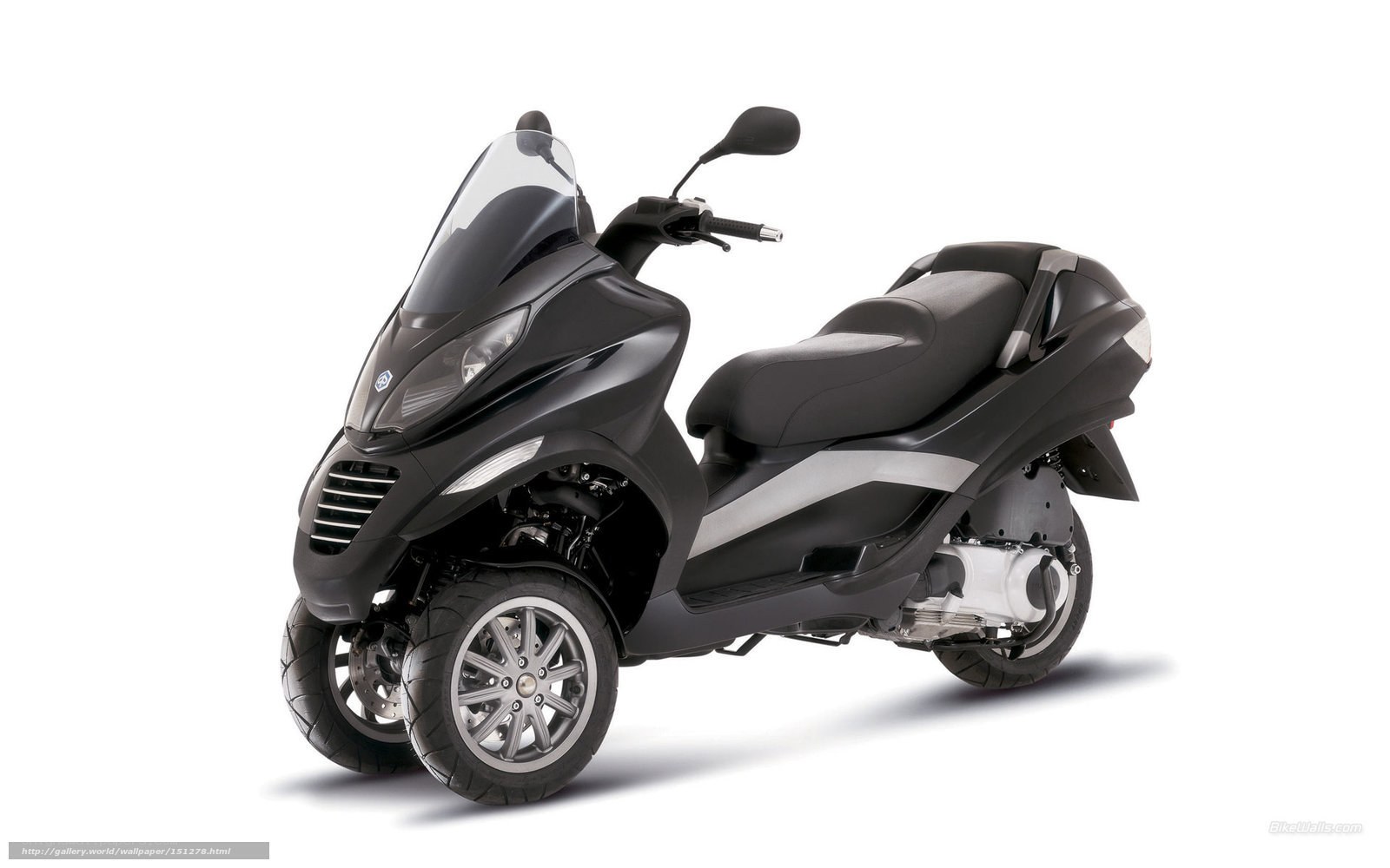 black three-wheeled scooter