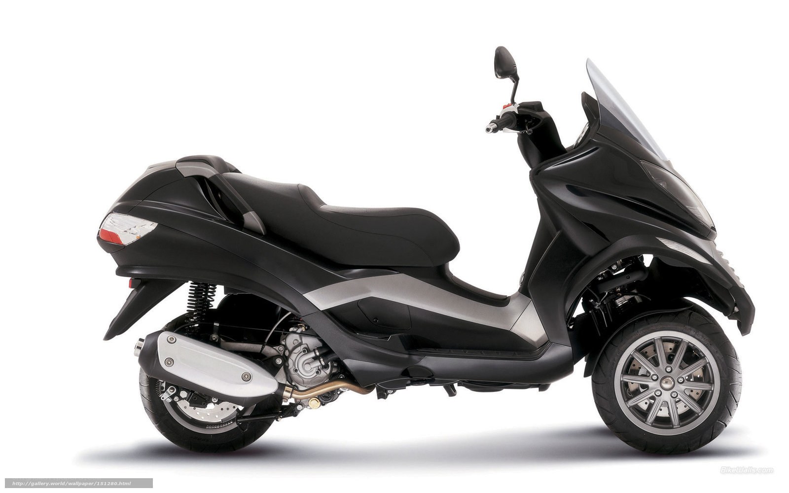 black three-wheeled scooter