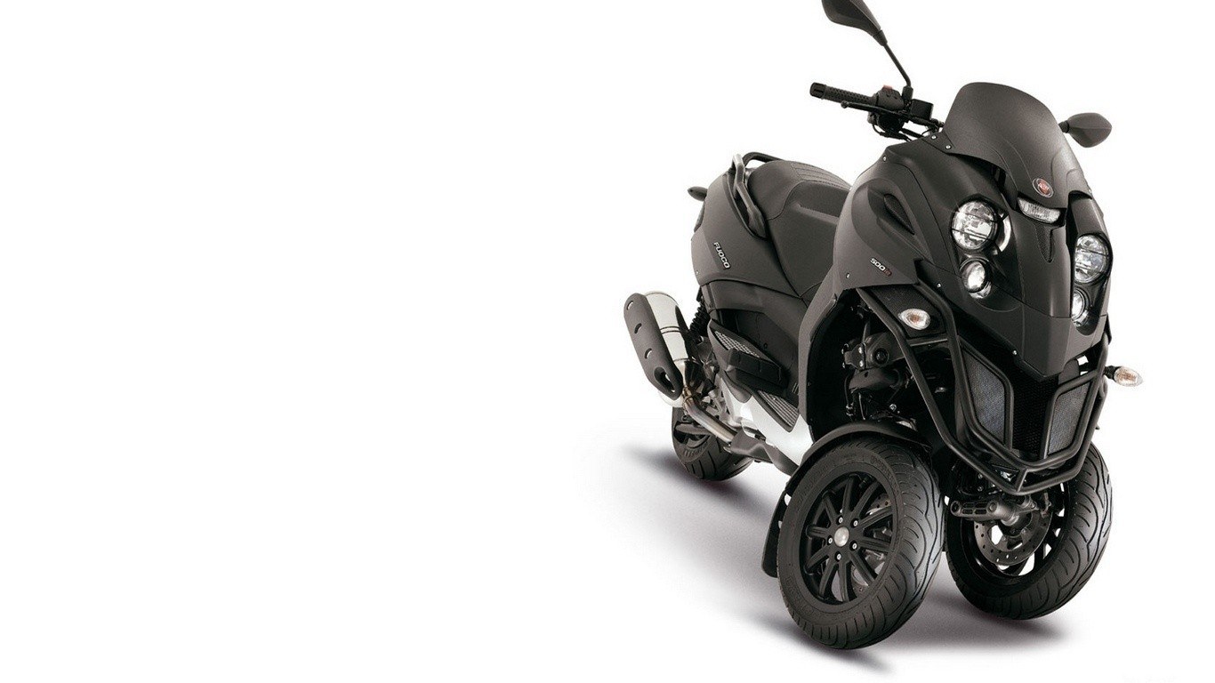 black three-wheeled scooter