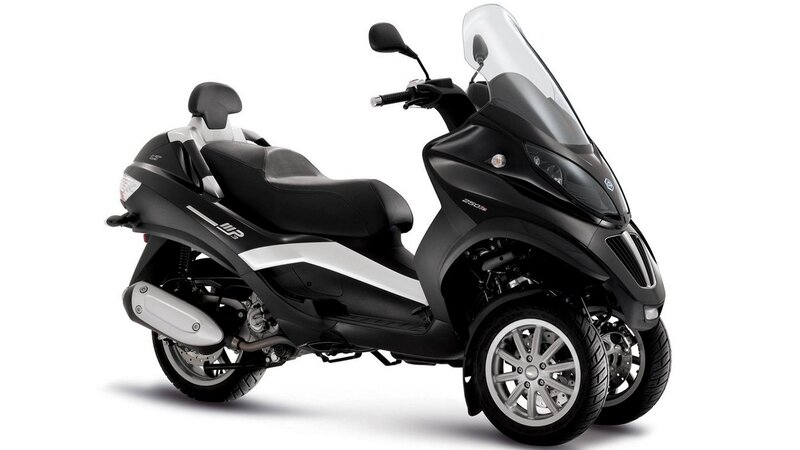black three-wheeled scooter