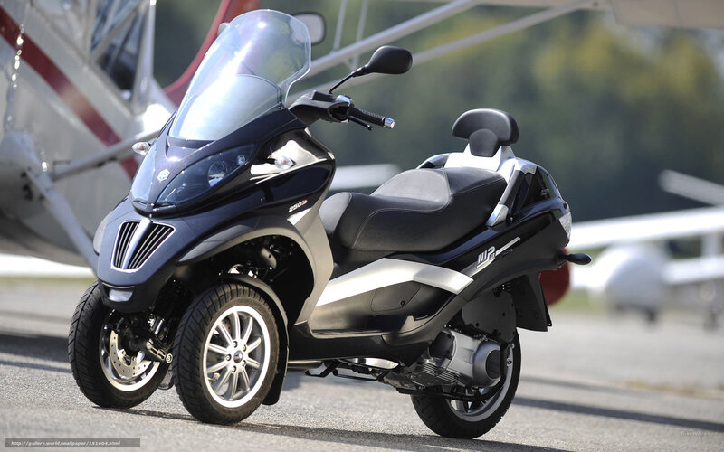 Black Three-wheeled Scooter — Calm, Afternoon