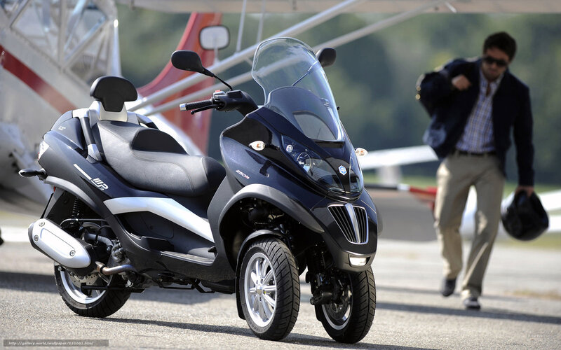 Black Three-wheeled Scooter — Calm