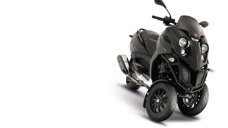 Black Three-wheeled Scooter — Neutral, Photograph, Wheels