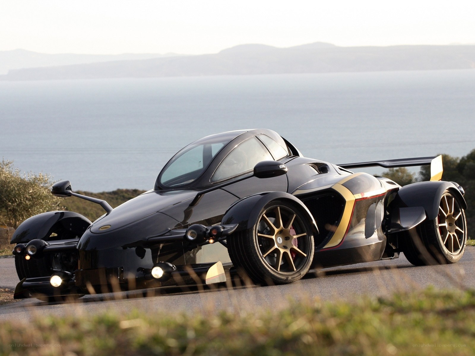 Black three-wheeled sports car