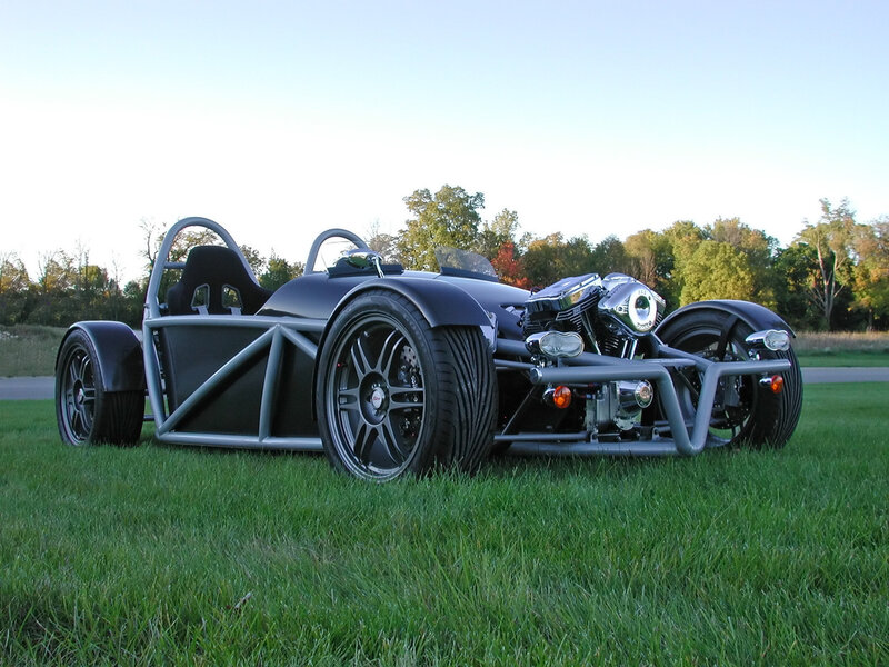 black three-wheeled sports car