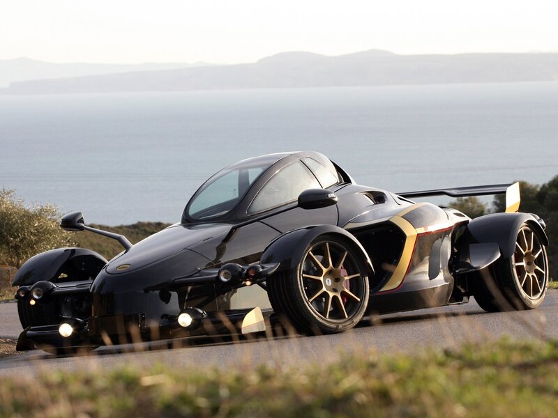 Black Three-wheeled Sports Car — Serene