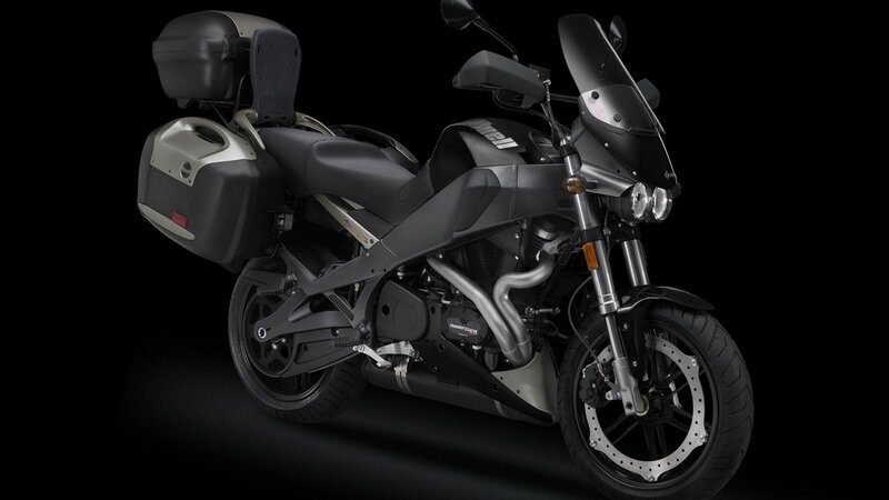 black touring motorcycle with luggage