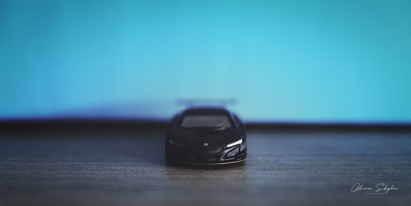 Black Toy Car — Blue