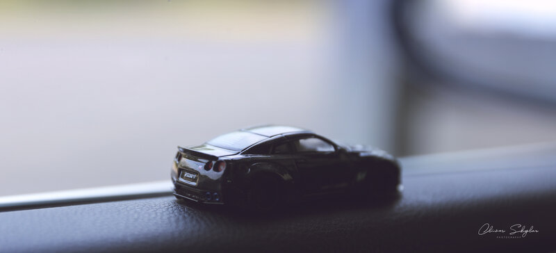 Black Toy Car — Calm, Photograph