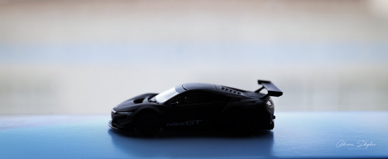 Black Toy Car Model — Minimalist