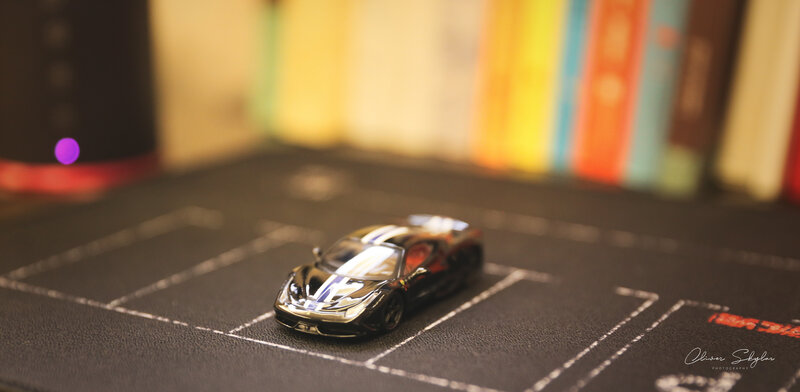 Black Toy Car on Table