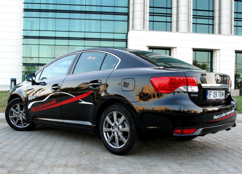Black Toyota Avensis sedan