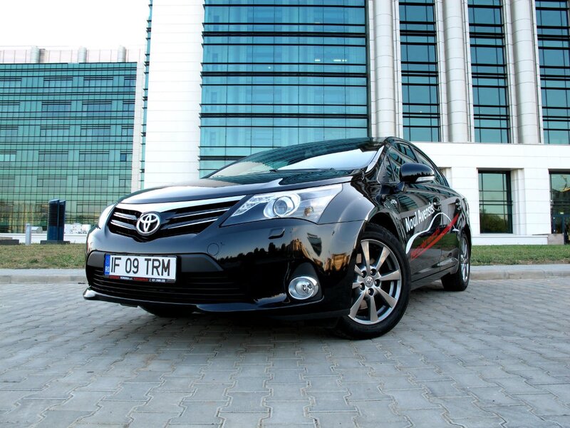 Black Toyota Avensis sedan